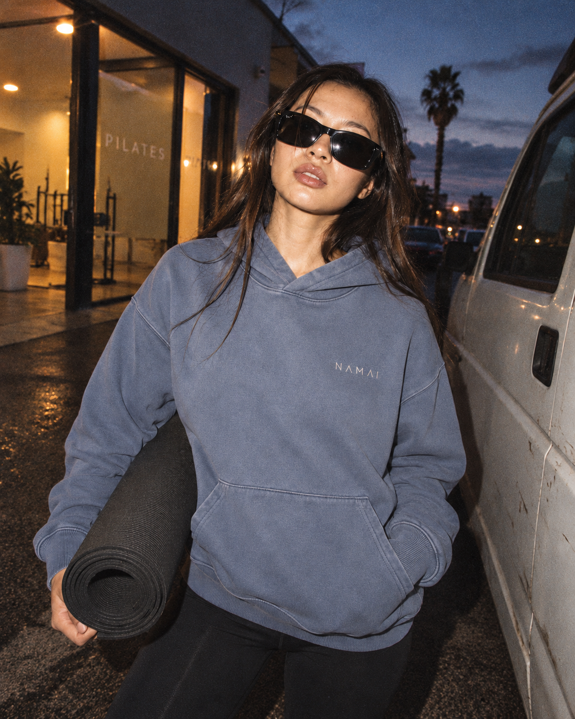 NAMAI Signature Vintage Hoodie — Blue Grey — female model, vintage campaign mockup (AI-generated)