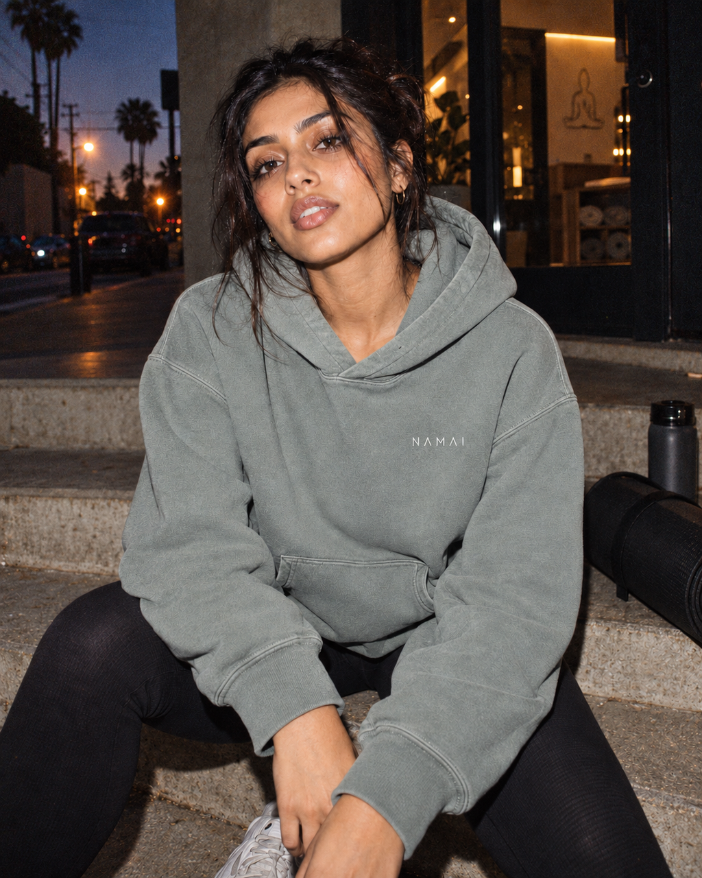 NAMAI Signature Vintage Hoodie — Misty Grey — female model, vintage campaign mockup (AI-generated)