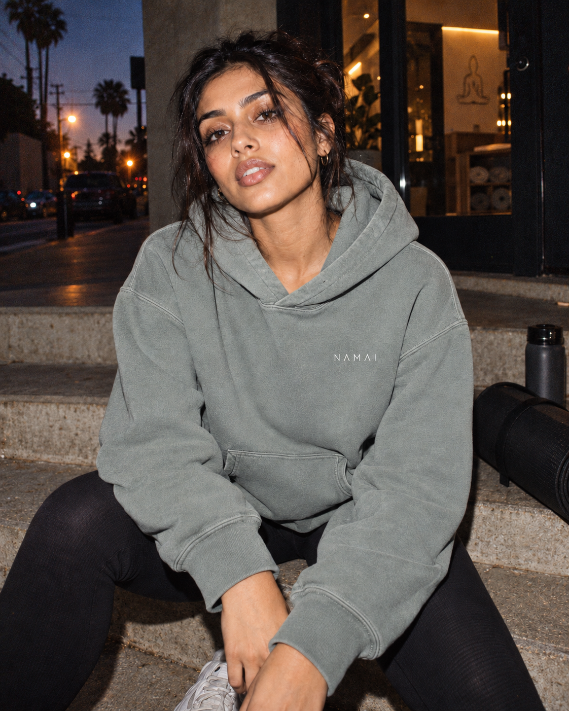 NAMAI Signature Vintage Hoodie — Misty Grey — female model, vintage campaign mockup (AI-generated)